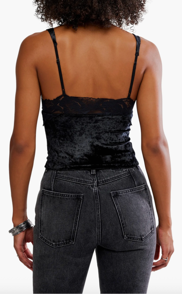 Velvety black camisole with a deep V-neck and lace detailing, perfect for layering or standalone elegance in Long Island boutique fashion.