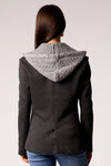 Chic blue cable knit blazer featuring a stylish grey knit hood, perfect for layering in Long Island boutique fashion.