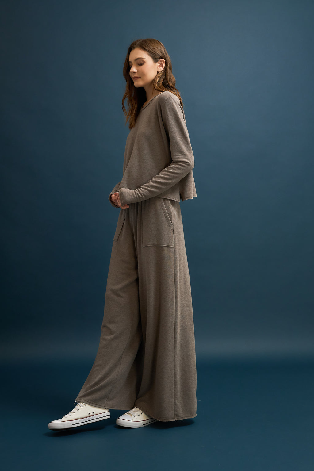 Soft French terry wide leg pants in a cozy taupe color, featuring front pockets and an elastic waistband, perfect for Long Island boutique fashion.