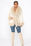 Cream-colored fur-trimmed coat with a belted waist, perfect for stylish layering in Long Island boutique fashion.