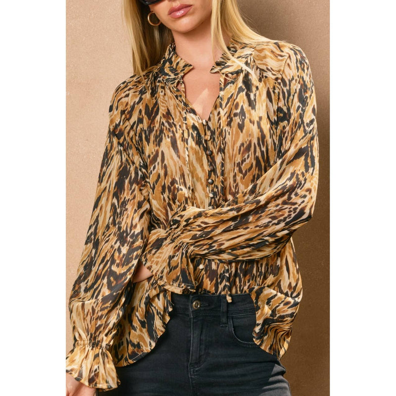 Flowy button-down blouse in a bold brown and black animal print, featuring a deep collar and ruffled cuffs, perfect for Long Island boutique fashion.