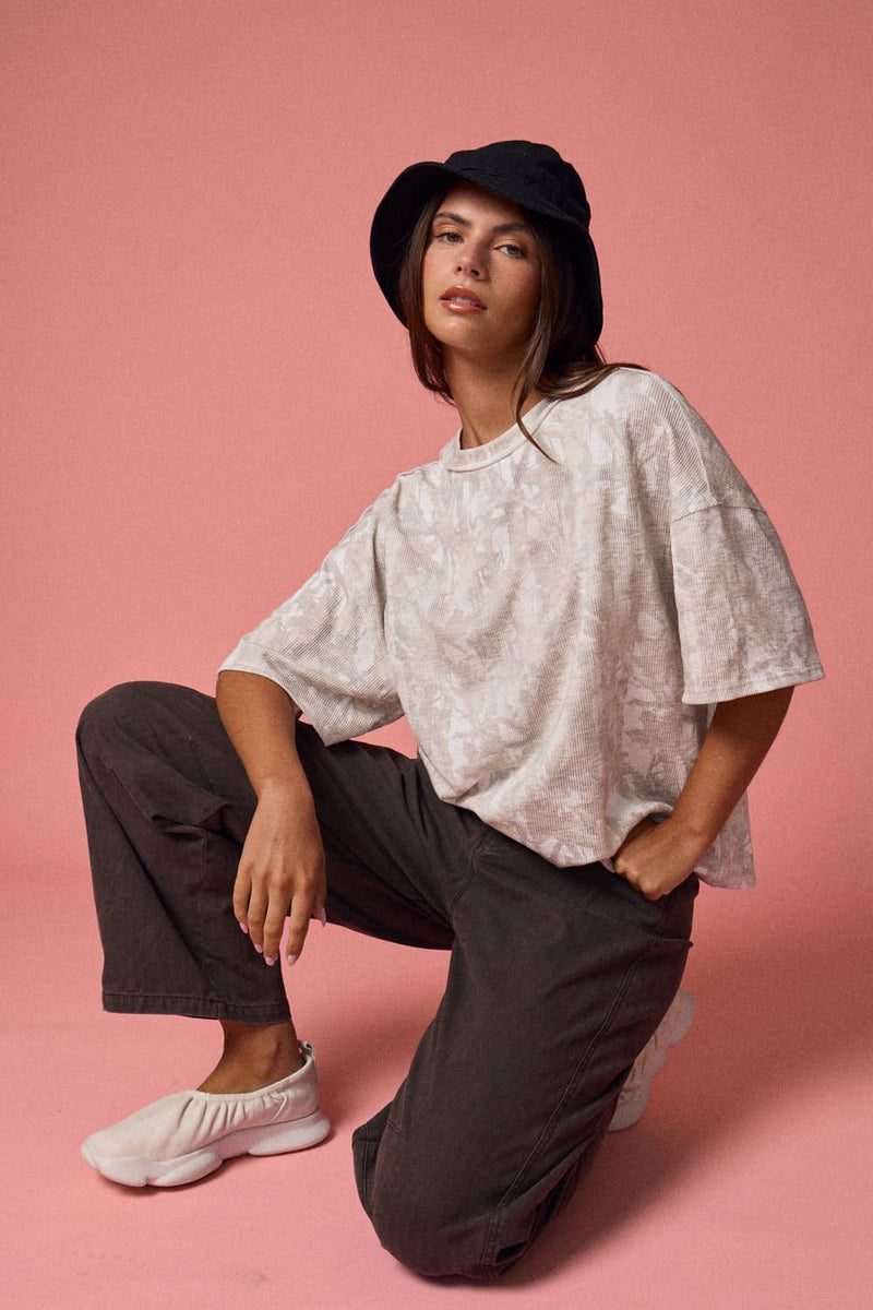 Relaxed camo ribbed shirt in soft beige tones, perfect for casual Long Island boutique fashion looks.