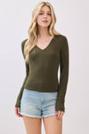 Fitted double layer V-neck long sleeve top in olive green, perfect for layering, showcasing Long Island boutique fashion.