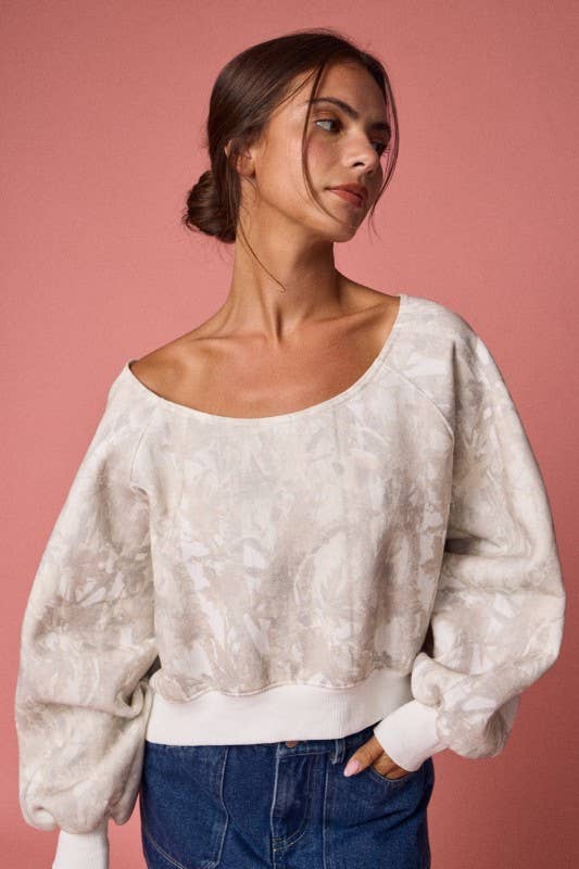 Off-shoulder camo print long sleeve top in soft beige, featuring balloon sleeves and a relaxed fit, perfect for Long Island boutique fashion.