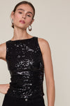 Vividly colored full sequin tank top, fitted design with a sleek silhouette, perfect for a night out from this Long Island fashion boutique.