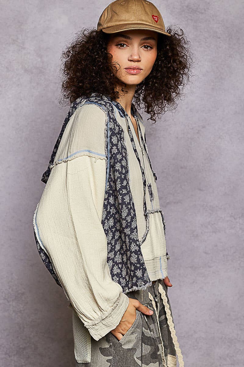 Lightweight gauze hoodie top featuring a cream color block design with floral accents, perfect for Long Island boutique fashion styling.