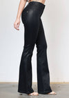 Coated black bootcut jeans featuring a sleek, shiny finish and a flattering fit, perfect for Long Island boutique fashion.