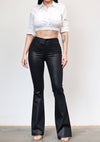 Sleek coated black bootcut jeans with a flattering fit and subtle sheen, perfect for any occasion at a Long Island fashion boutique.