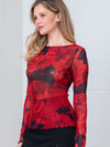 Elegant boat neck long sleeve top featuring a vibrant red and black floral mesh design, perfect for Long Island boutique fashion.