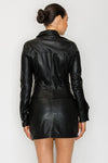 Sleek black faux leather button-up top with a tailored fit and stylish collar, perfect for Long Island boutique fashion.