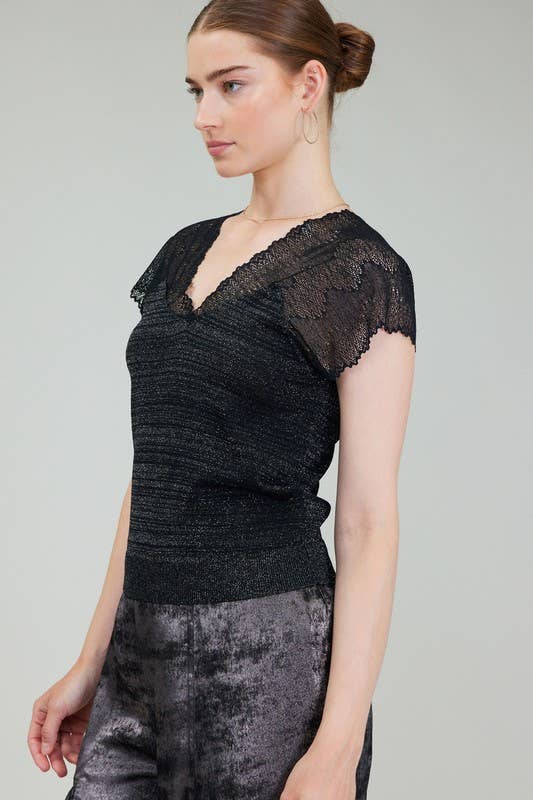 Elegant black Glitter Woven Combo Sweater with a delicate lace cap sleeve, perfect for a chic Long Island boutique fashion look.