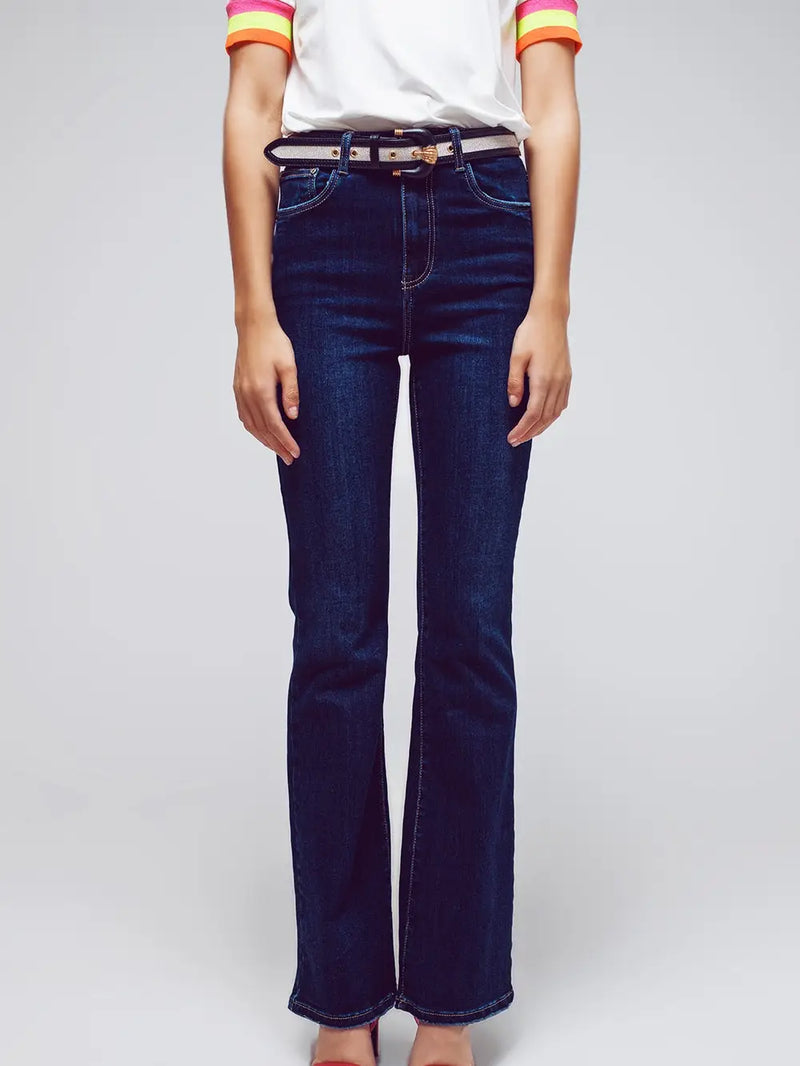 Model wearing dark wash High Waisted Flared Jeans in stretch denim — sleek, flattering fit with a subtle flare, available at TandyWear Boutique in Commack, NY. front view