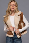 Warm faux suede vest in rich tan with soft inner fur lining, featuring a zip-up front, perfect for stylish layering in Long Island boutique fashion.