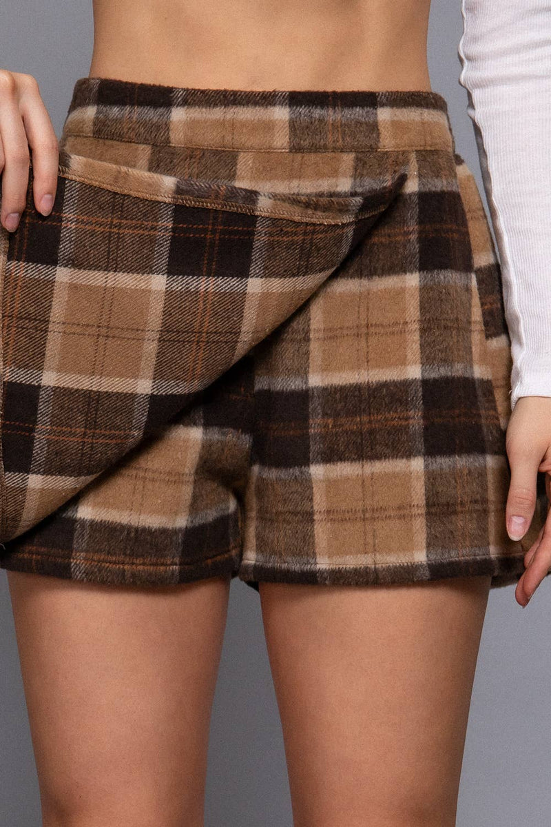 Front wrap plaid short pants in warm browns and blacks with a stylish draped design, perfect for chic Long Island boutique fashion.