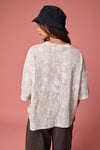 Camo ribbed loose fit shirt in soft muted tones, perfect for effortless layering, reflecting Long Island boutique fashion.