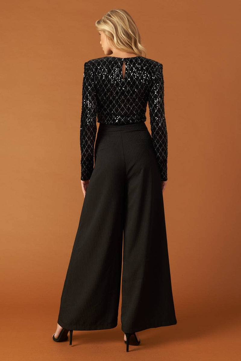 Stylish black sequin bodysuit with long sleeves and a chic keyhole back, perfect for a night out in Long Island boutique fashion.