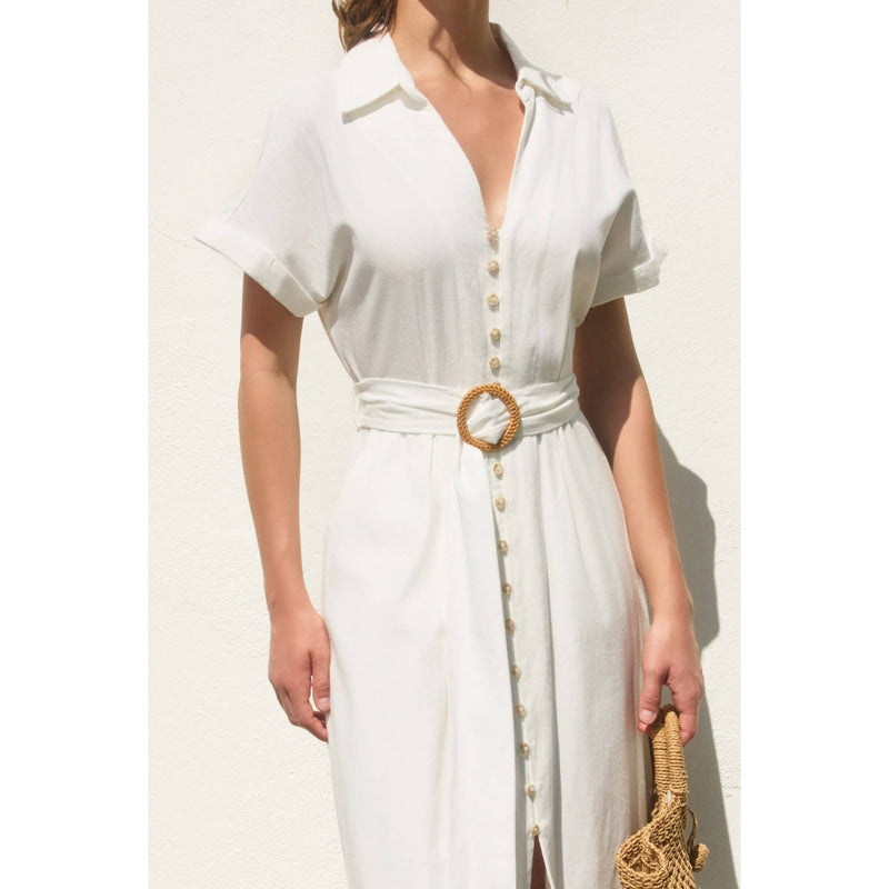 Chic white button-down maxi dress with short sleeves, a tied waist featuring a wicker buckle, perfect for Long Island boutique fashion.