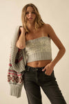 Cozy alpine-knit shrug cardigan paired with a fitted, grey tube top, perfect for layering in Long Island boutique fashion.