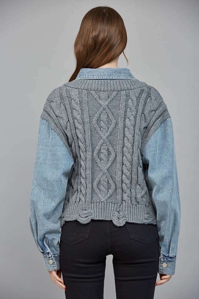 Cozy gray knit combined sweater with denim sleeves, featuring a cable design and a cropped fit, perfect for Long Island boutique fashion.