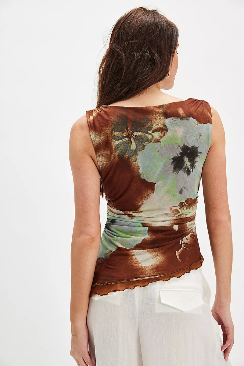Brown and green floral printed knit top with a fitted silhouette and subtle ruffle detailing, perfect for Long Island boutique fashion.
