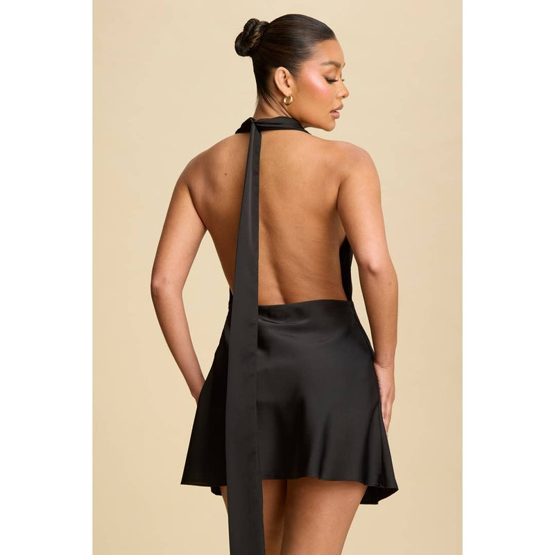 Sleek black satin mini dress featuring a draped cowl neckline and open back, perfect for Long Island boutique fashion events.