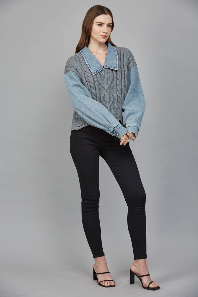 Chunky knit sweater in gray with denim sleeves and a collared neckline, perfect for cozy Long Island boutique fashion looks.