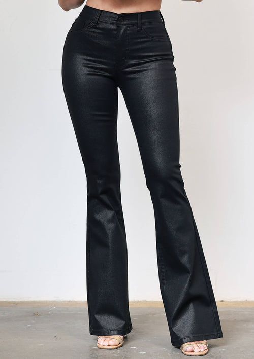 Sleek coated black bootcut jeans featuring a flattering high waist and a glossy finish, a stylish choice from a Long Island boutique fashion.