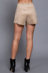 Front wrap faux suede short pants in a neutral beige color, offering a chic fit ideal for stylish outings from a Long Island boutique fashion.