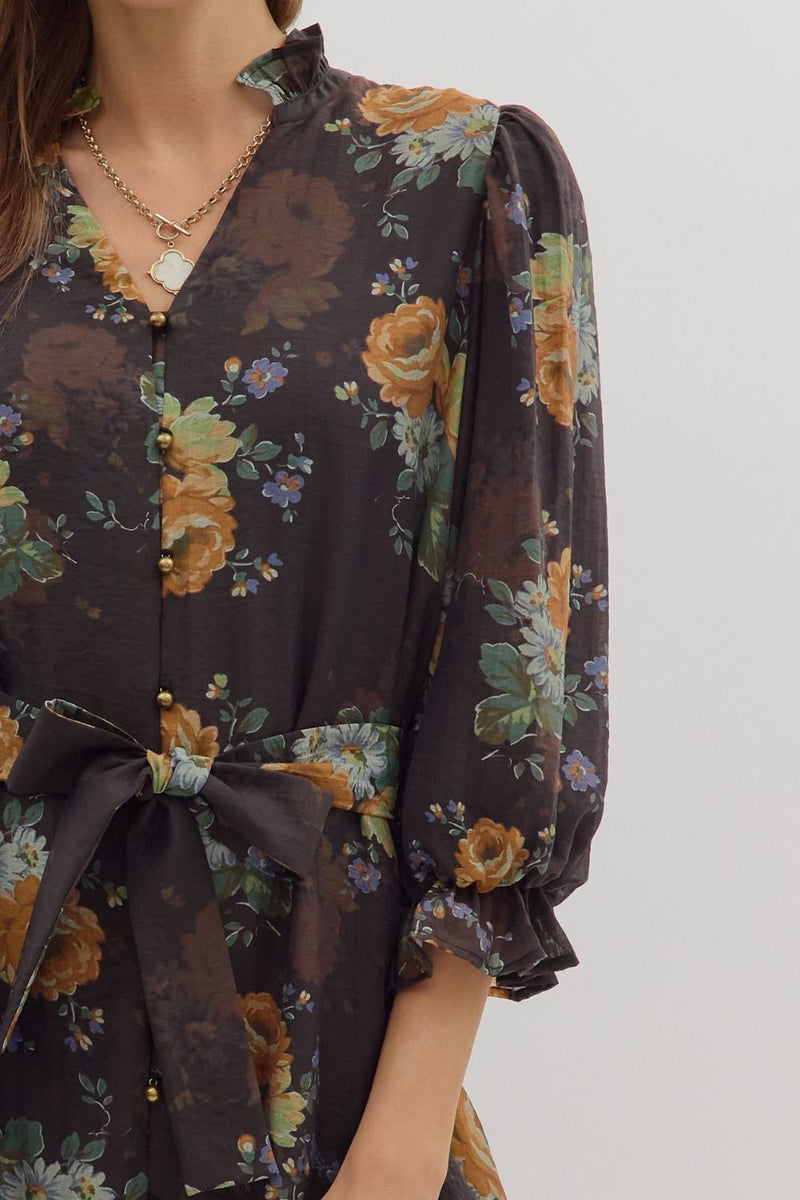 Embrace elegance in this floral print 3/4 sleeve mini dress featuring a cinched waist and muted tones, perfect for Long Island boutique fashion.