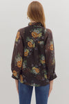 Flowy floral print puff sleeve top featuring rich earthy tones and delicate ruffle details, perfect for Long Island boutique fashion.