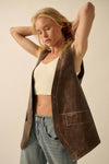 Brown faux leather snap-front vest featuring a relaxed fit and stylish pockets, perfect for Long Island boutique fashion.
