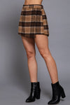 Brown plaid front wrap short pants featuring a tailored fit, perfect for stylish layering in Long Island boutique fashion.