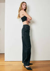 High-waisted barrel baggy jeans in a deep black wash featuring a relaxed fit, perfect for chic Long Island boutique fashion.