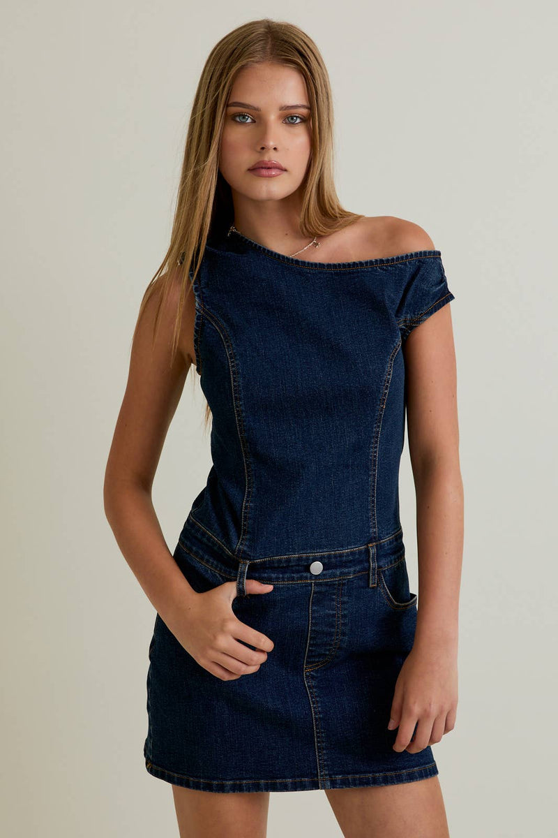 Asymmetrical shoulder denim dress in dark blue, featuring a fitted bodice and a casual skirt, perfect for trendy Long Island boutique fashion.