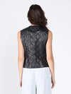 Quilted black leather crew neck vest with a fitted silhouette, perfect for layering in Long Island boutique fashion.