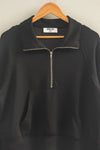 Stylish black half zip high neck collar sweatshirt with a front pocket, perfect for cozy wear at a Long Island boutique fashion.