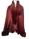 Rich burgundy faux fur poncho cape with a plush collar, perfect for layering in stylish comfort, ideal for Long Island boutique fashion.