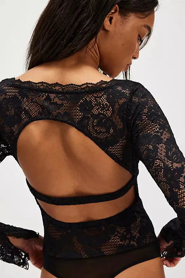 Black lace long-sleeve bodysuit featuring a delicate floral pattern and cut-out back, perfect for Long Island boutique fashion styles.