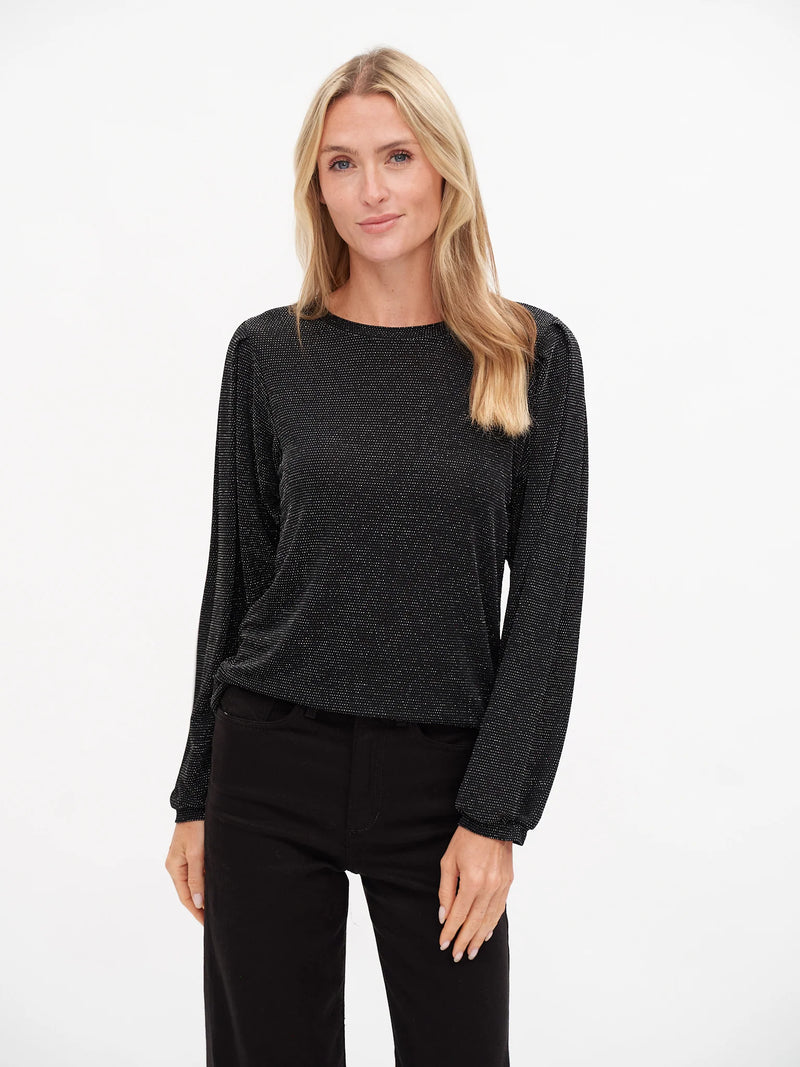 Shimmering black long sleeve top featuring a dotted lurex pattern and relaxed fit, perfect for Long Island boutique fashion.