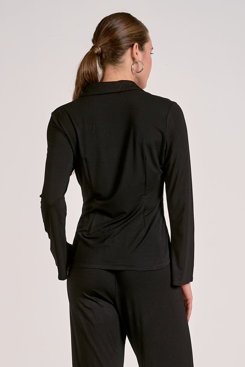 A fitted black long sleeve button top with a sleek collar, perfect for versatile layering in Long Island boutique fashion.