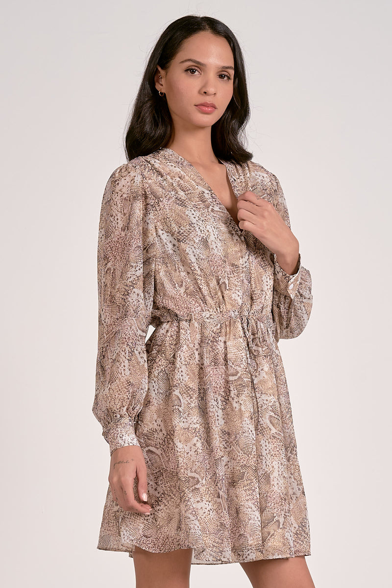 Long-sleeve mini dress in a snakeskin print, featuring a cinched waist and soft, flowing fabric for an effortless Long Island boutique fashion look.
