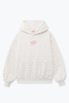 Cozy white puff core hoodie adorned with delicate pink floral patterns and a front pocket, perfect for Long Island boutique fashion.