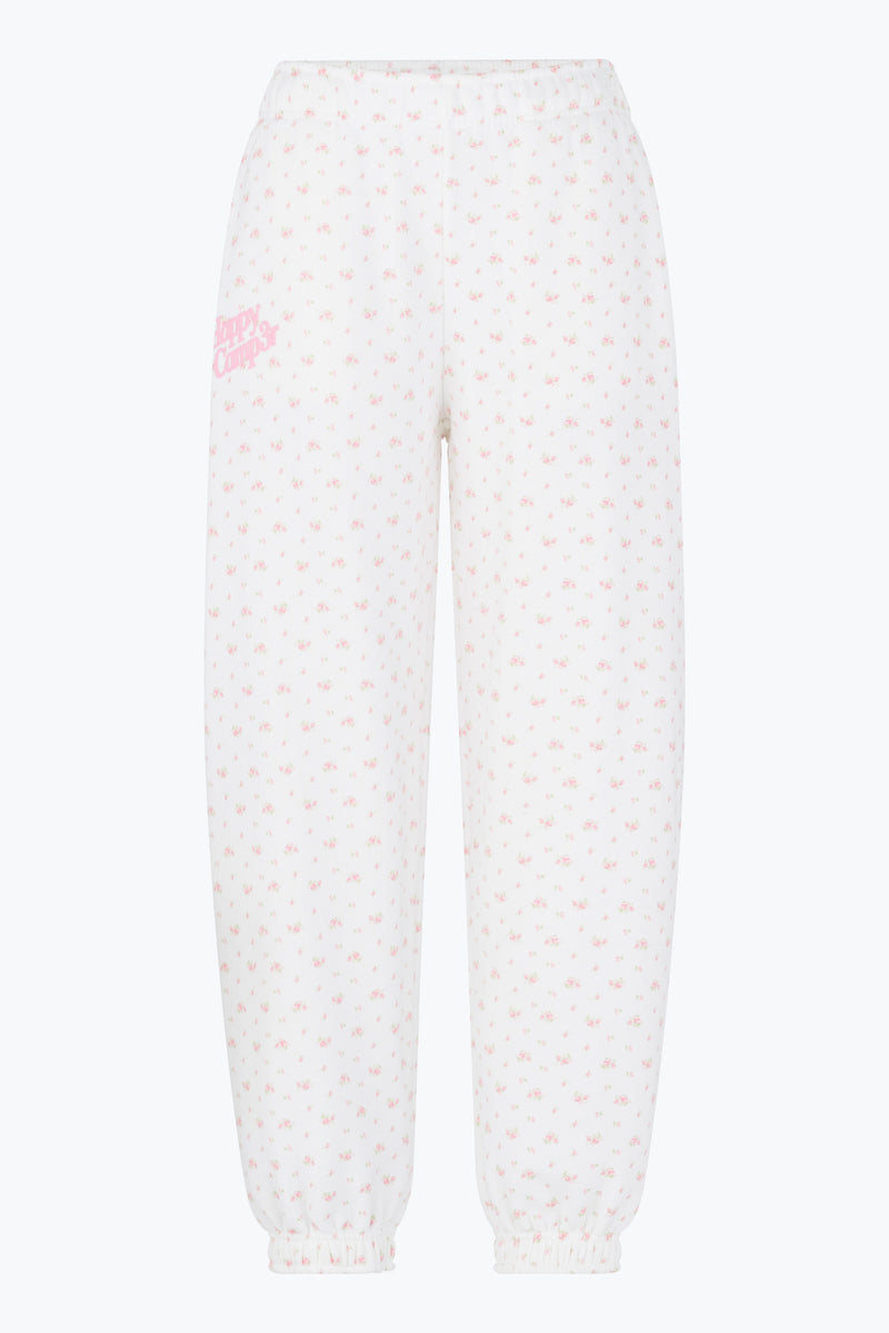 Lightweight joggers featuring a delicate pink floral pattern on a white background, perfect for relaxed days in Long Island boutique fashion.