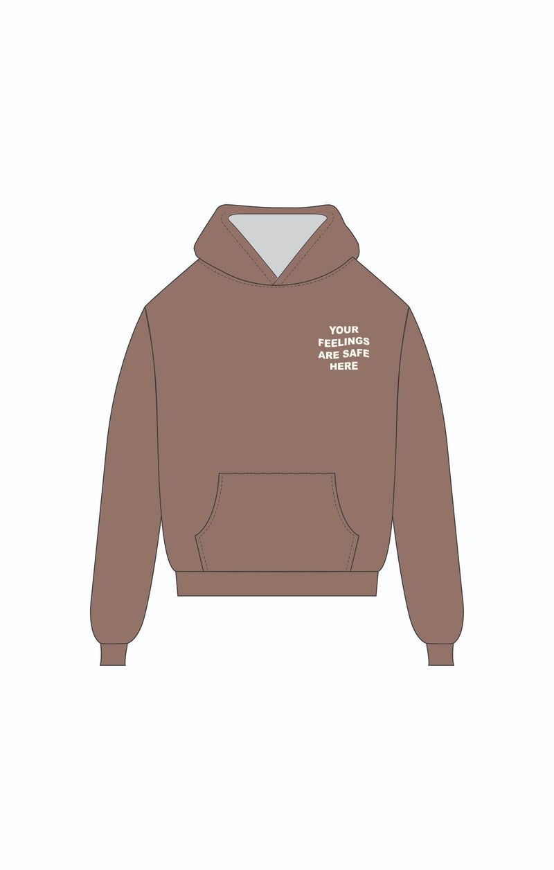 Cozy brown hoodie featuring the uplifting phrase "YOUR FEELINGS ARE SAFE HERE," perfect for Long Island boutique fashion lovers.