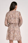 Long-sleeve mini dress in a soft beige and brown snake print with a cinched waist, perfect for Long Island boutique fashion.
