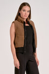 Brown zip-up vest with a cozy fleece texture and sleeveless design, perfect for layering in Long Island boutique fashion.