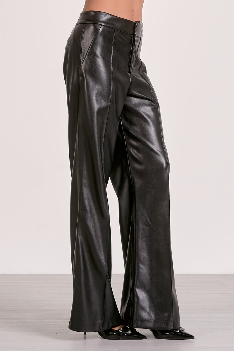 High-waisted black flare pants featuring a sleek leather finish, tailored fit, and a stylish silhouette, perfect for Long Island boutique fashion.