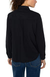 Chic collared zip front knit shirt in classic black, featuring long sleeves and a relaxed fit, perfect for Long Island boutique fashion.