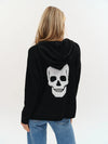 Cozy black hoodie featuring a bold white graphic skull design on the back, perfect for stylish layering from this Long Island boutique fashion.