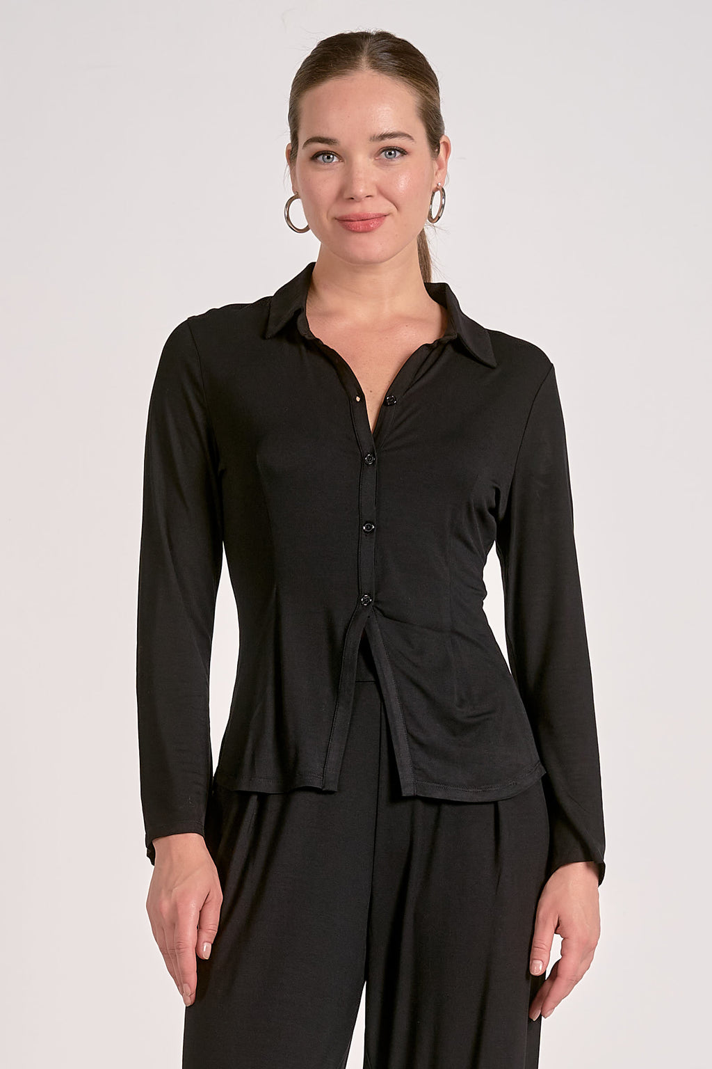 Sleek black long sleeve button top with a collared neckline and relaxed fit, perfect for casual or polished looks in Long Island boutique fashion.